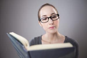 Woman reading book - Antisocial personality disorder and hypnotherapy