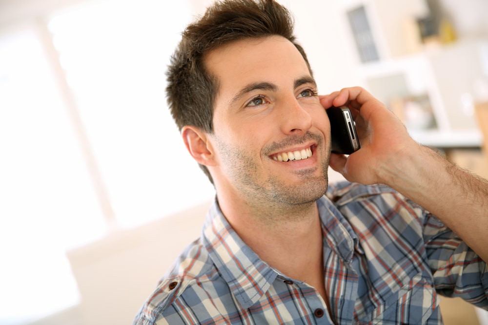 man on telephone talking individual hypnotherapy clinical supervision