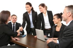 people in a meeting hypnotherapy career