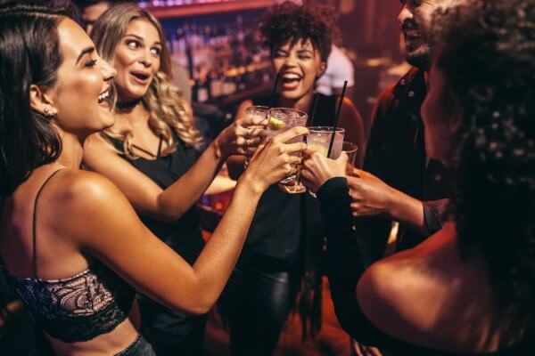 hypnotherapy and ego strengthening party women drinking alcohol fun smile laugh