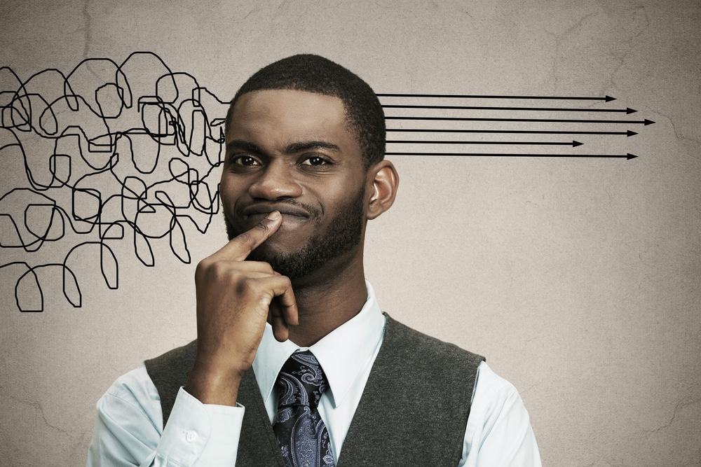 Belief change image for irrational rational beliefs of a man in a shirt and tied by lines